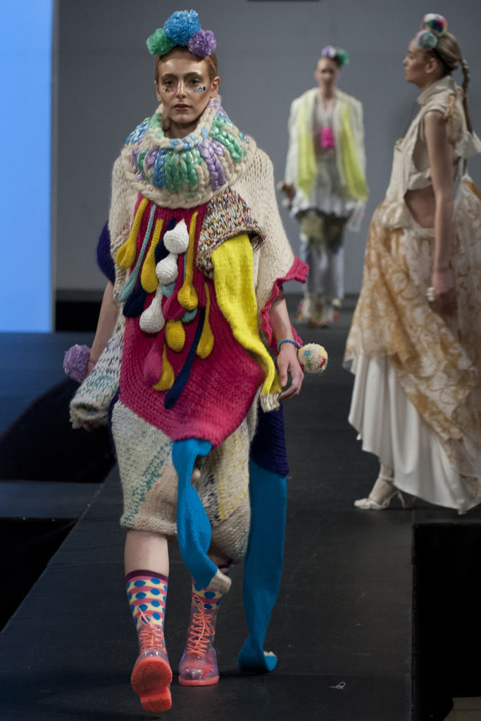 SAIC runway presentation featuring layered knitwear look