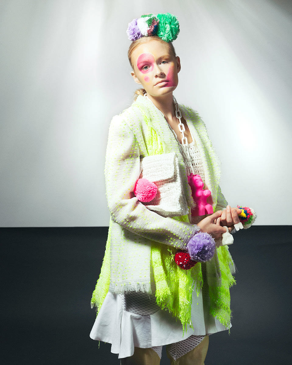 Archive image of neon-accented knit coat and accessories